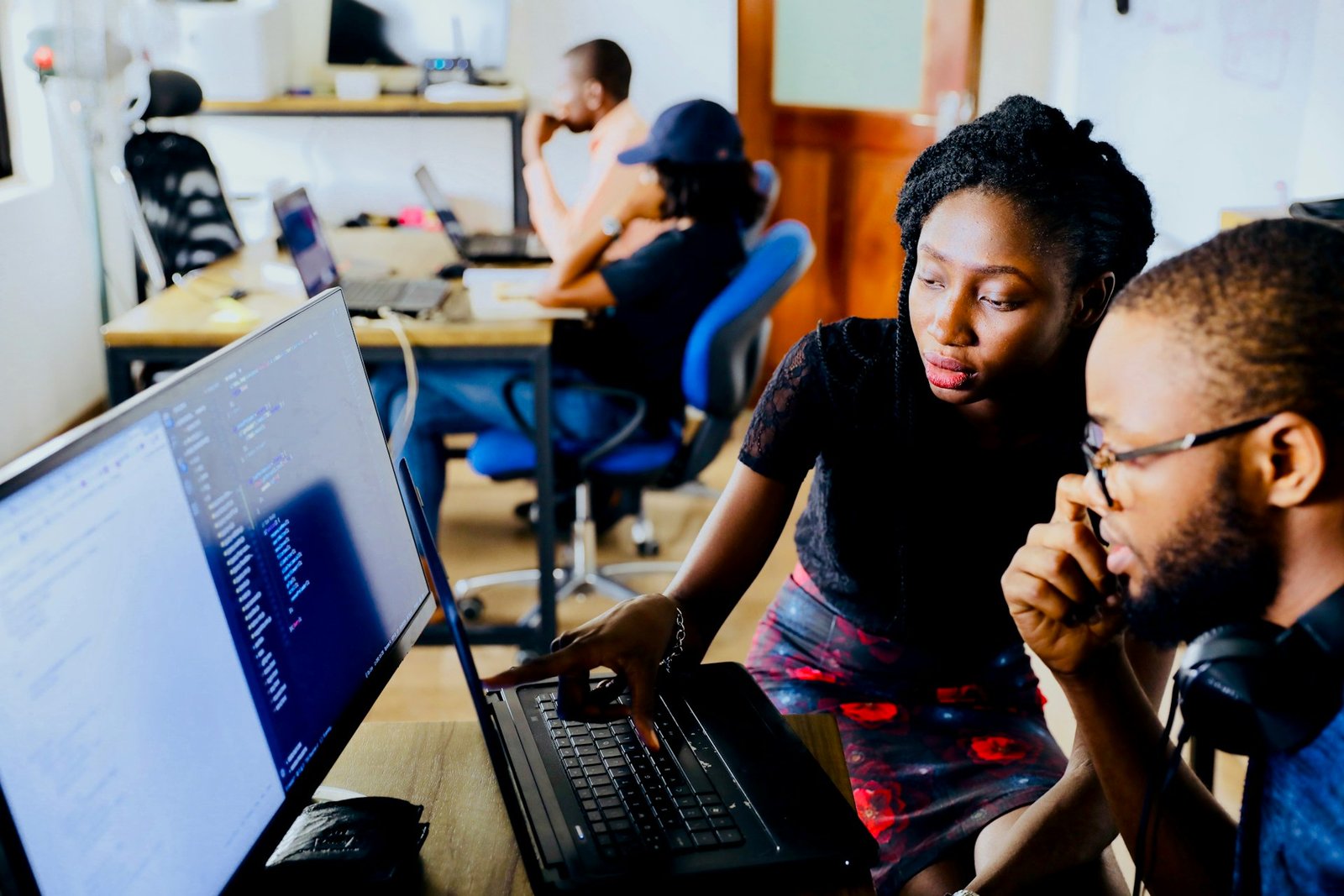 Software engineers collaborating on product and systems